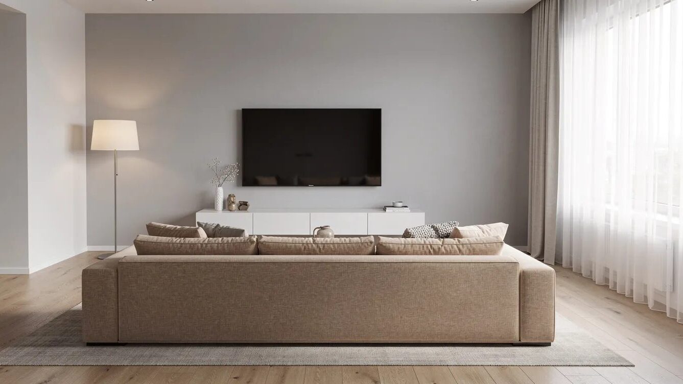 MagentaTV ohne Receiver: Alle Möglichkeiten, Geräte & Kosten im Überblick 1 Wohnzimmer mit TV Gerät.